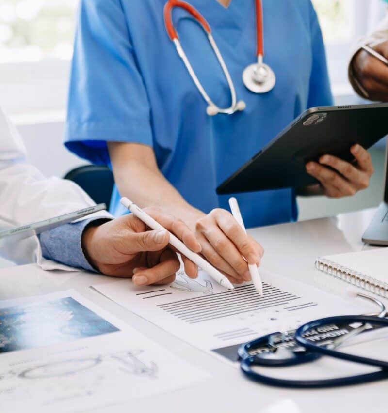 Healthtech startup team collaborating with medical experts